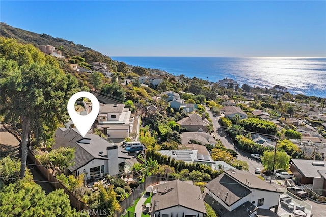 birds eye view of property featuring a water view