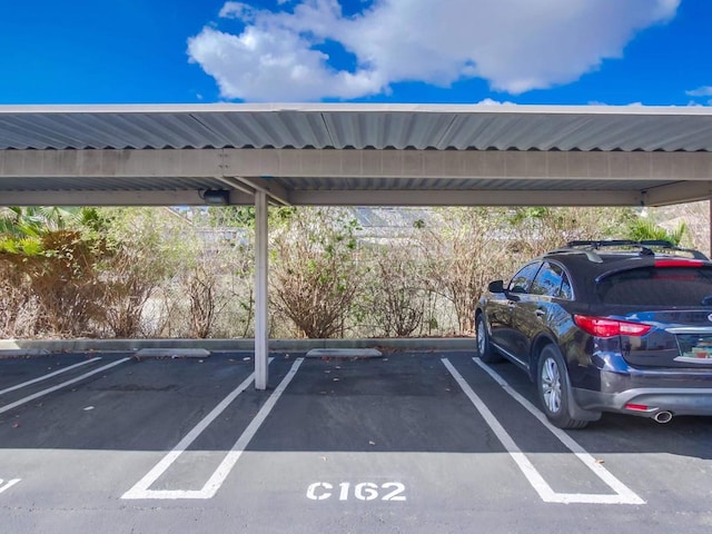 view of car parking with a carport