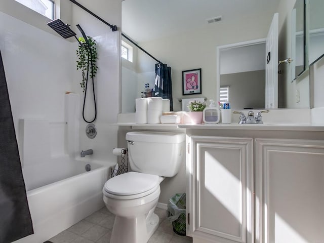 bathroom with visible vents, toilet, tile patterned flooring, shower / bath combination with curtain, and vanity