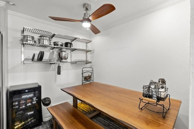 interior space with crown molding, beverage cooler, and ceiling fan