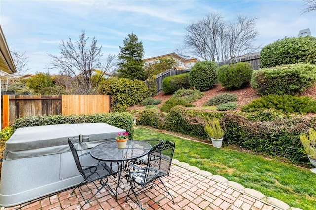 view of patio with a hot tub