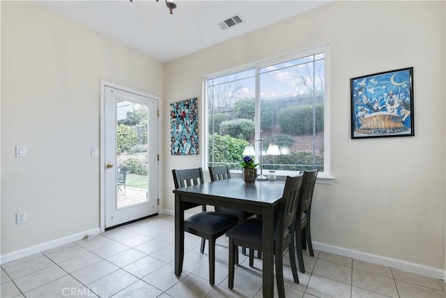 view of tiled dining space