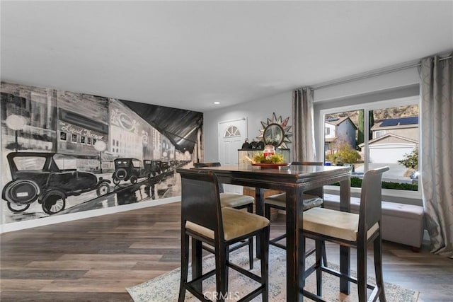 dining space featuring recessed lighting and wood finished floors