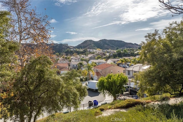 property view of mountains with a residential view