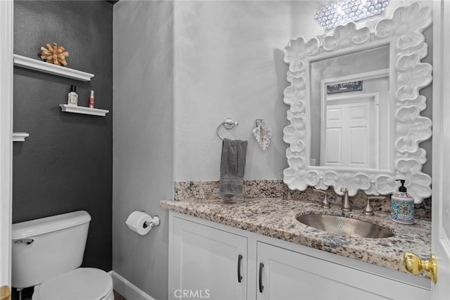 half bath with toilet and vanity