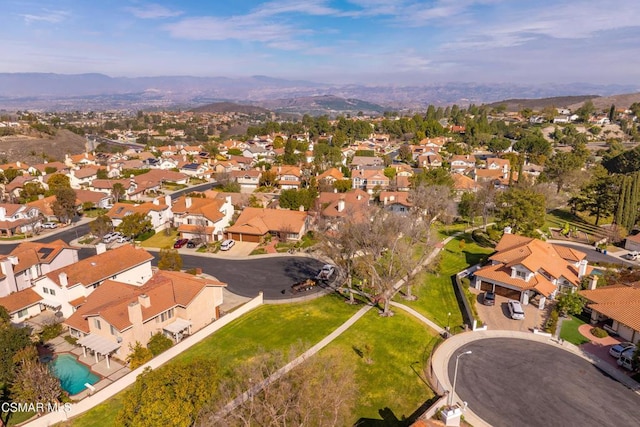 drone / aerial view featuring a mountain view