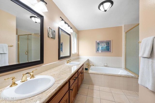 bathroom with vanity, tile patterned floors, and independent shower and bath