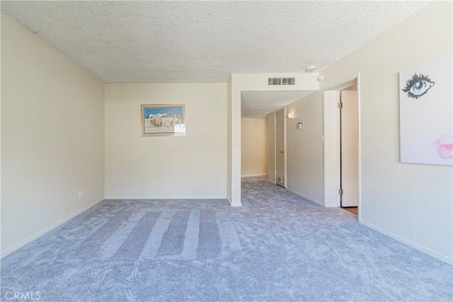 2260 N Cahuenga Blvd Unit 507, Los Angeles, CA 90068 - carpeted empty room featuring a textured ceiling and baseboards