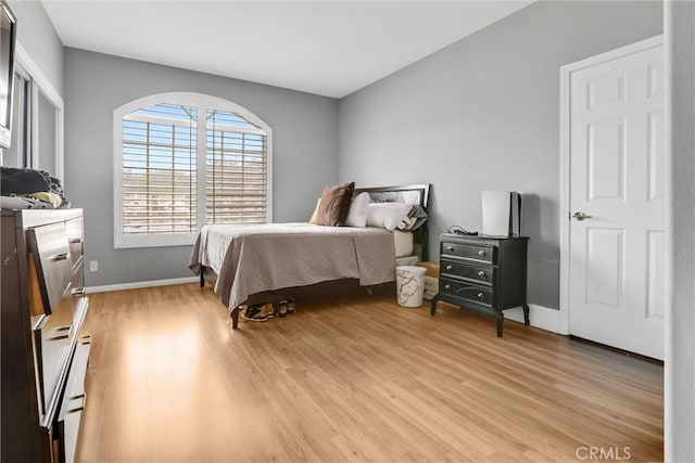 bedroom with light hardwood / wood-style floors