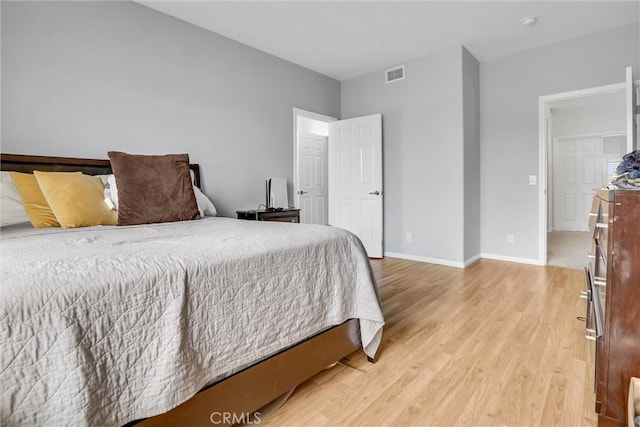 bedroom featuring light wood-type flooring