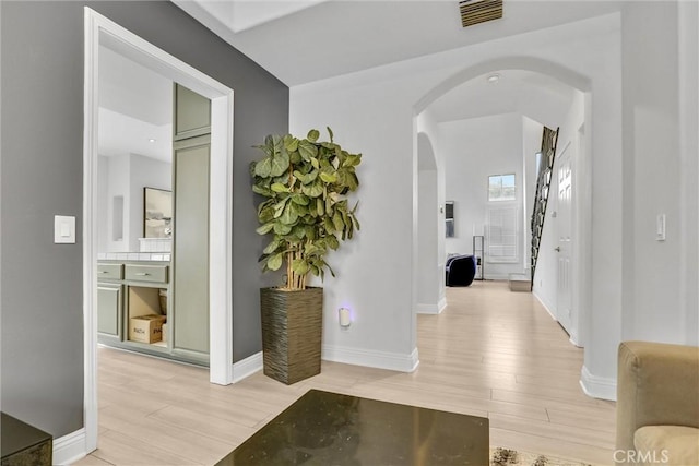 corridor featuring light hardwood / wood-style flooring