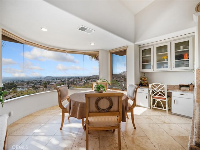 sunroom featuring built in desk