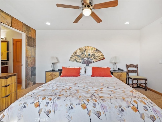 carpeted bedroom with ceiling fan