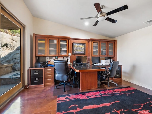 home office featuring dark wood-type flooring, ceiling fan, and lofted ceiling