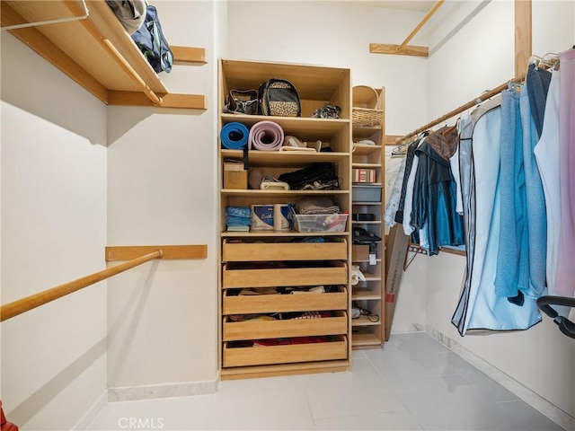 spacious closet featuring tile patterned floors