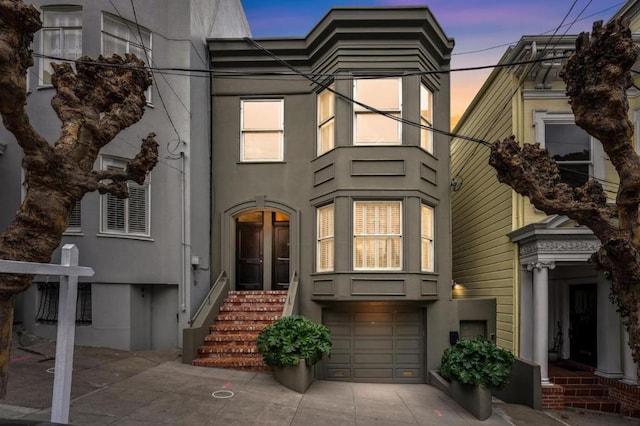 view of front of home featuring a garage