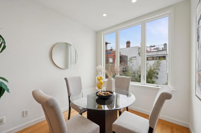 dining area with light wood-type flooring