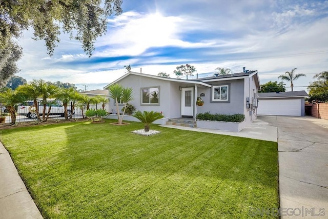 ranch-style home featuring a front yard