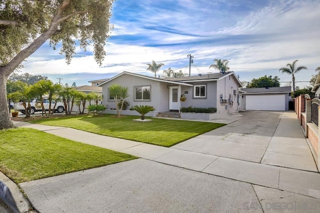 single story home with a garage and a front yard