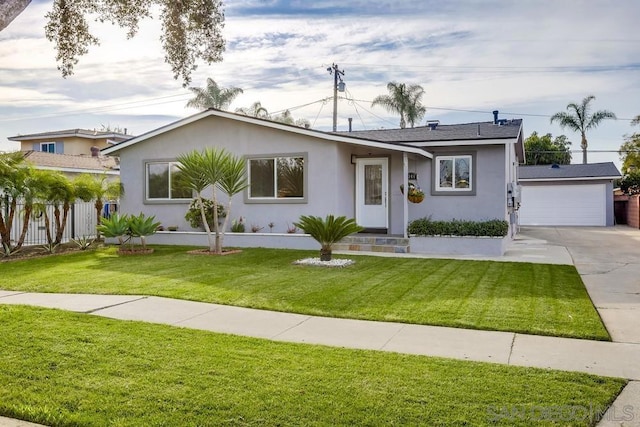 single story home with a garage and a front lawn