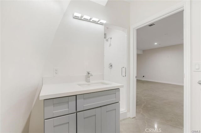 bathroom featuring vanity and concrete floors