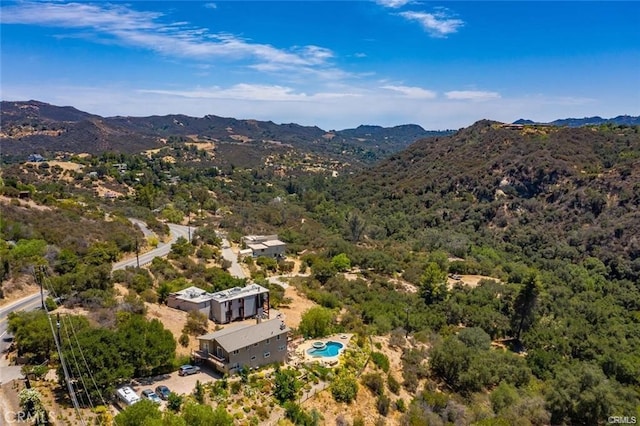 drone / aerial view featuring a mountain view