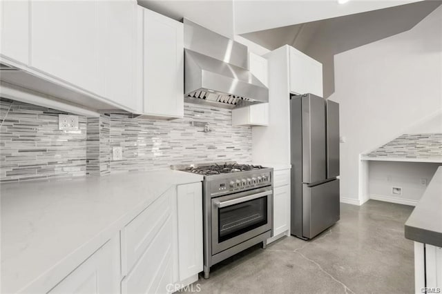 kitchen with white cabinetry, stainless steel appliances, range hood, and tasteful backsplash