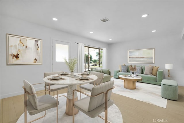 dining space featuring recessed lighting, visible vents, baseboards, and wood finished floors