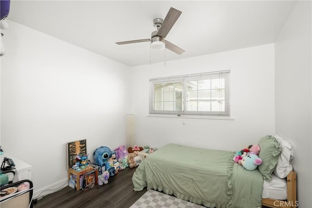 bedroom with hardwood / wood-style flooring and ceiling fan