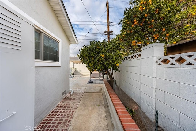 view of home's exterior featuring a patio area