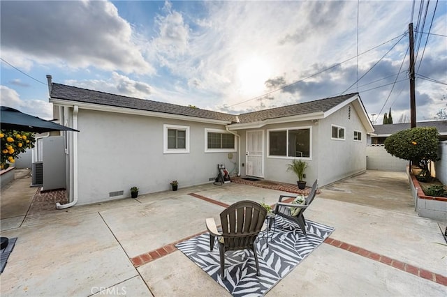 rear view of property with a patio area