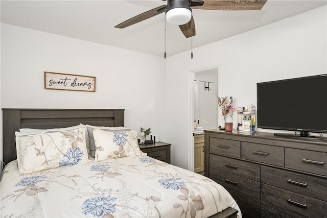 bedroom featuring ceiling fan and ensuite bathroom