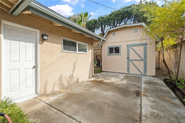 exterior space with a storage shed