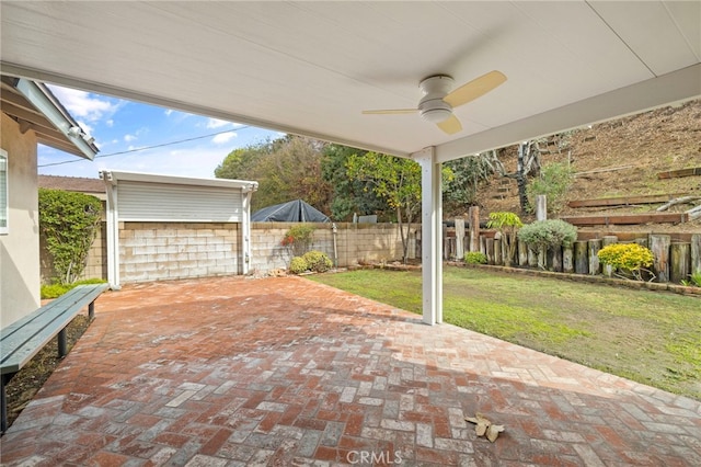 view of patio with ceiling fan