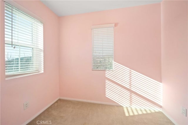 view of carpeted spare room