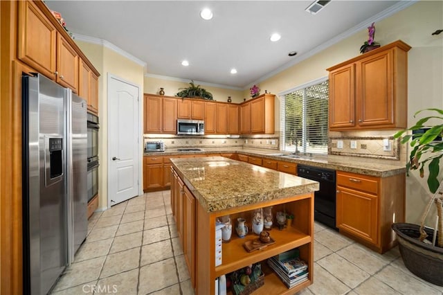 kitchen with tasteful backsplash, ornamental molding, a center island, stainless steel appliances, and light stone countertops