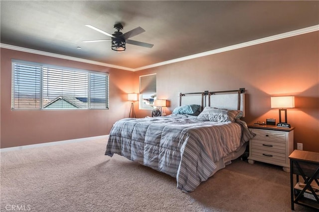 carpeted bedroom with ornamental molding and ceiling fan