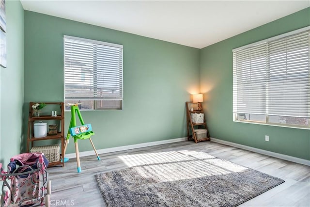 sitting room with light wood-type flooring