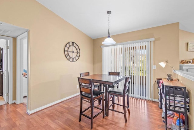 dining area featuring light wood-type flooring