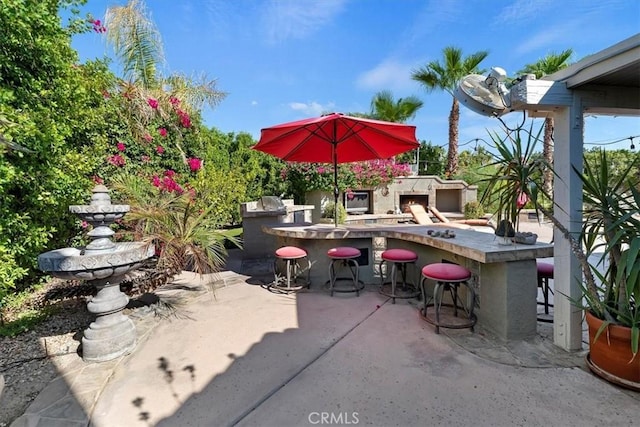 view of patio with a bar