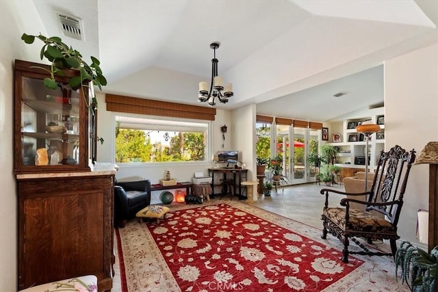 living area featuring vaulted ceiling, light tile patterned floors, and an inviting chandelier