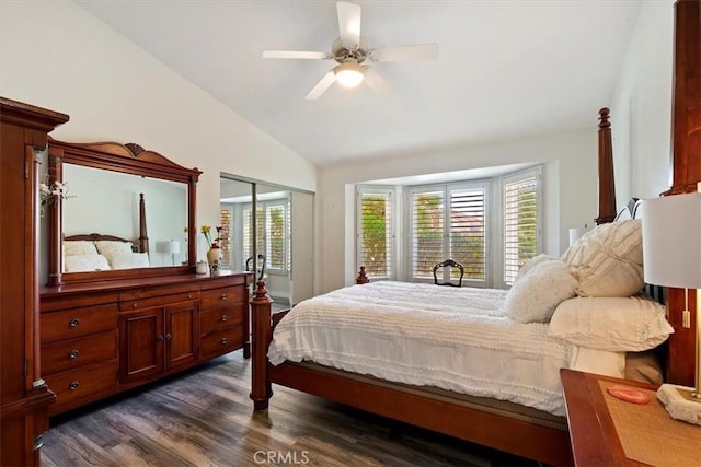 bedroom featuring dark wood-type flooring, ceiling fan, and vaulted ceiling