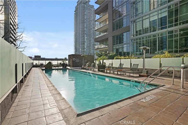 view of swimming pool featuring a patio