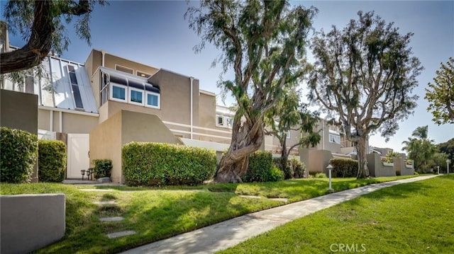 exterior space with a lawn