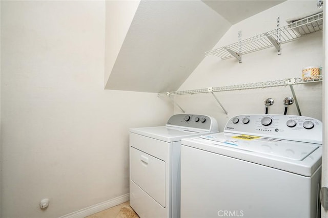 laundry room featuring washing machine and dryer