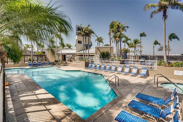 view of pool featuring a patio area