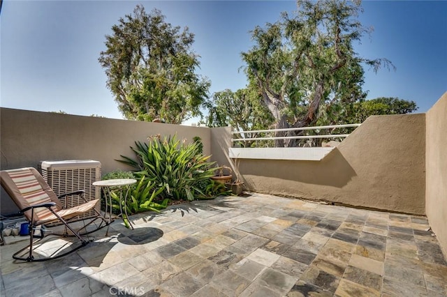 view of patio featuring central AC unit