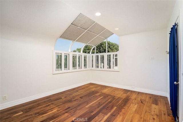 empty room featuring wood-type flooring