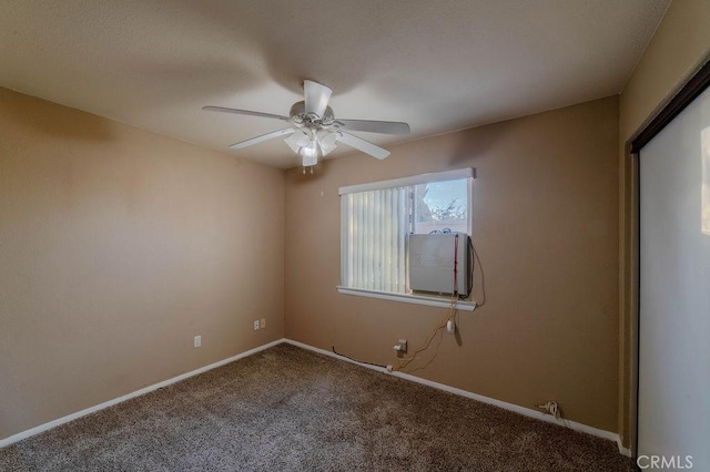 unfurnished room with carpet and ceiling fan