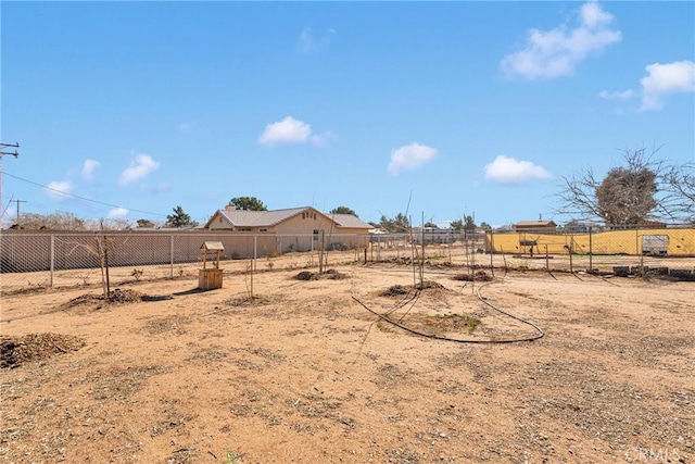 view of yard with a rural view